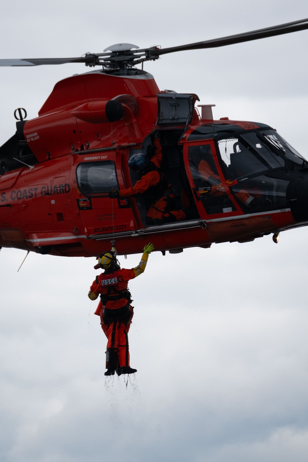 U.S. Coast Guard MH-65 dolphin conducts a search and rescue demonstration off the Homeport Pier in Staten Island during Fleet Week NYC 2025.