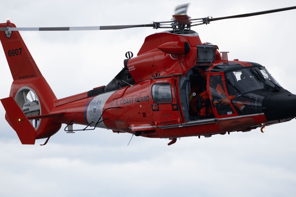 U.S. Coast Guard MH-65 dolphin conducts a search and rescue demonstration off the Homeport Pier in Staten Island during Fleet Week NYC 2025.