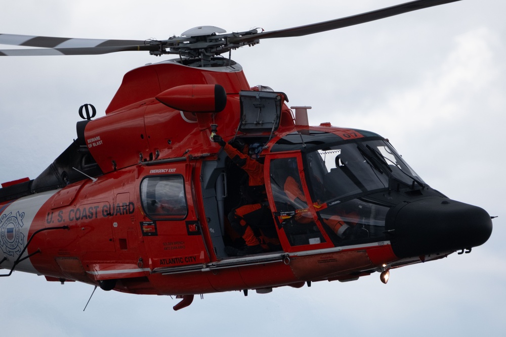 U.S. Coast Guard MH-65 dolphin conducts a search and rescue demonstration off the Homeport Pier in Staten Island during Fleet Week NYC 2025.