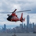 U.S. Coast Guard MH-65 dolphin conducts a search and rescue demonstration off the Homeport Pier in Staten Island during Fleet Week NYC 2025.