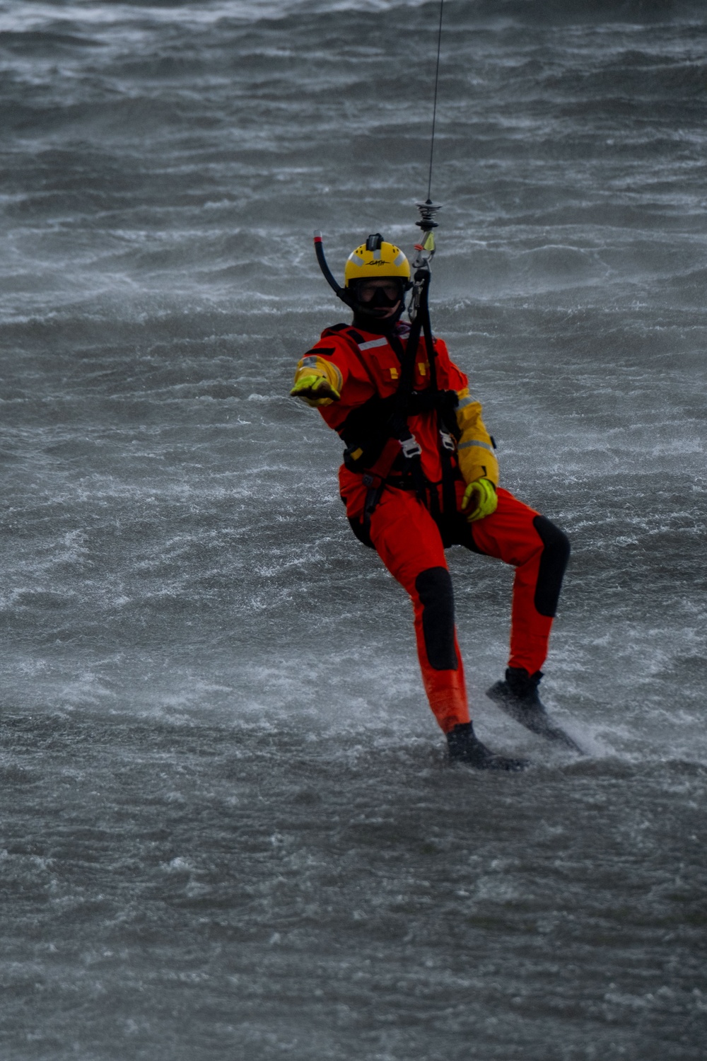 U.S. Coast Guard MH-65 dolphin conducts a search and rescue demonstration off the Homeport Pier in Staten Island during Fleet Week NYC 2025.