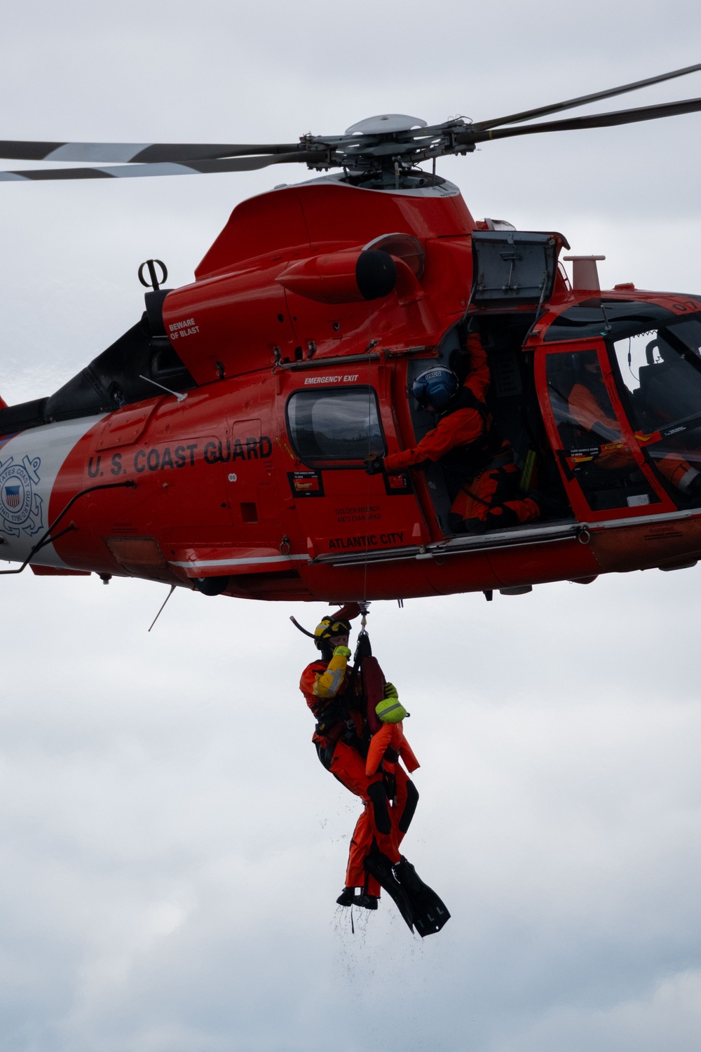 U.S. Coast Guard MH-65 dolphin conducts a search and rescue demonstration off the Homeport Pier in Staten Island during Fleet Week NYC 2025.