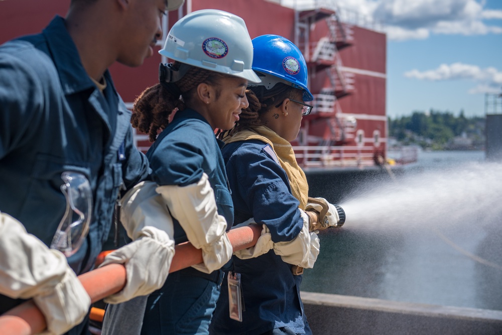 USS Ronald Reagan (CVN 76) Sailors conduct firefighting training
