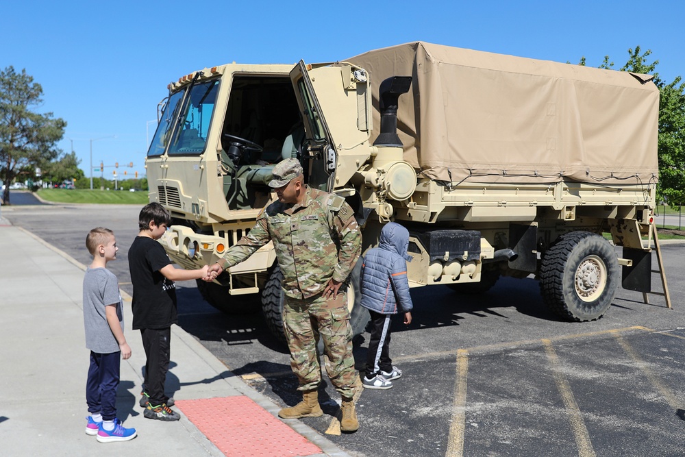 Students receive an Army experience during a local “Touch a truck” event
