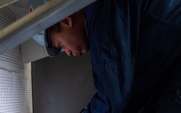 USS Ronald Reagan (CVN 76) Sailors conduct routine operations and ship maintenance