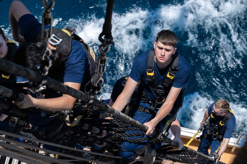 USCGC Eagle crew teaches cadets how to climb masts