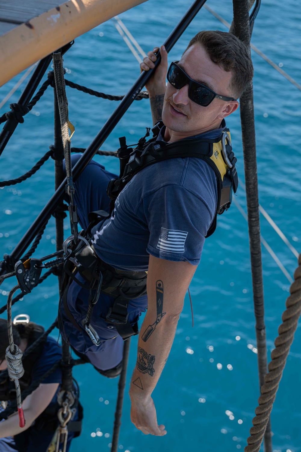 USCGC Eagle crew teaches cadets how to climb masts