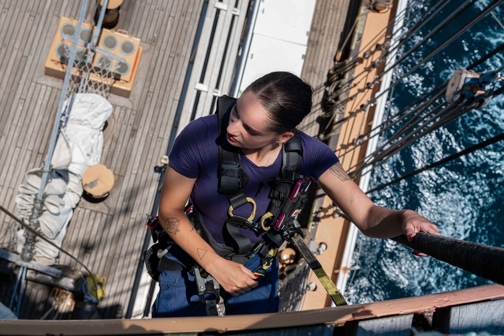 USCGC Eagle crew teaches cadets how to climb masts