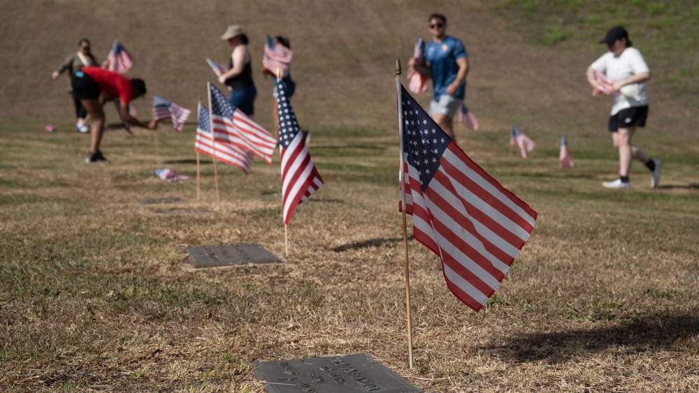 Camp Blaz Marines assist with flag placement for Memorial Day