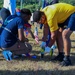 Military and civillian volunteers plant 3,050 flags for Memorial Day weekend