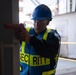 USS John C. Stennis (CVN 74) Sailors conduct a security drill
