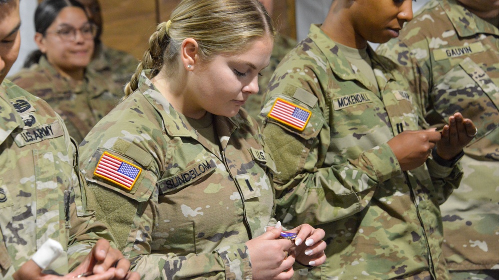 U.S. Soldiers receive coins