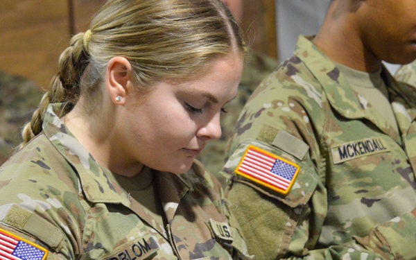 U.S. Soldiers receive coins