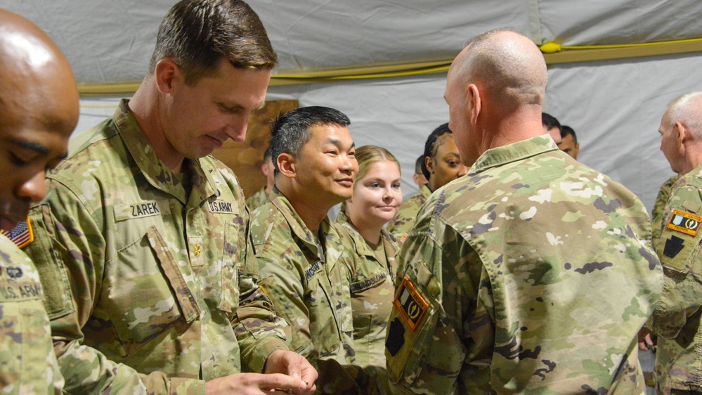 U.S. Soldiers receive coins
