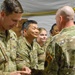 U.S. Soldiers receive coins