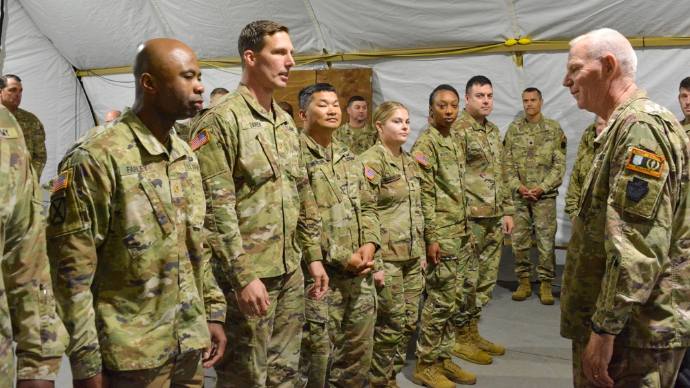 U.S. Soldiers receive coins