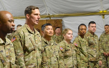U.S. Soldiers receive coins