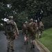 Soldiers from the 3d U.S. Infantry Regiment (The Old Guard) carry American flags to place at headstones as part of “Flags In” at Arlington National Cemetery, Arlington, Va., May 22, 2025.