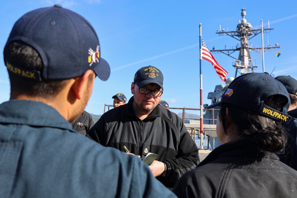 Chief Fire Controlman (Aegis) William Kercher gives topside preservation instructions