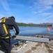 Cryptologic Technician (Technical) 2nd Class Darren Grant  scrapes, cleans and prepares surfaces for preservation and painting
