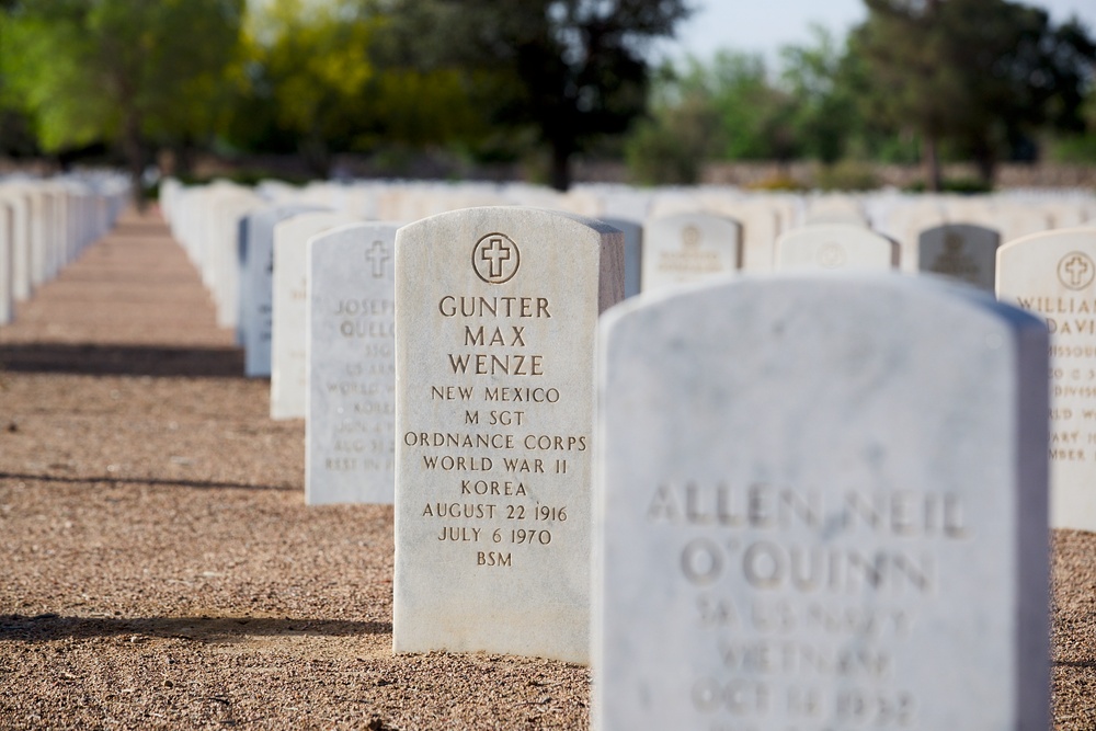 Flags placed at Fort Bliss National Cemetery before Memorial Day