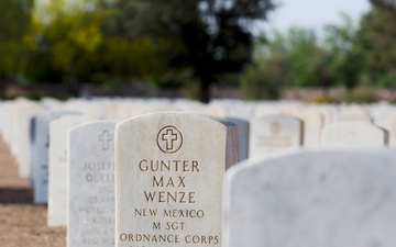 Flags placed at Fort Bliss National Cemetery before Memorial Day