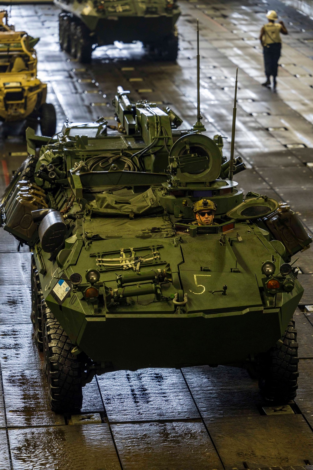 U.S. Marines Assigned to 22nd MEU Depart USS Iwo Jima During An Exercise