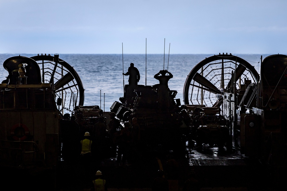 U.S. Marines Assigned to 22nd MEU Depart USS Iwo Jima During An Exercise