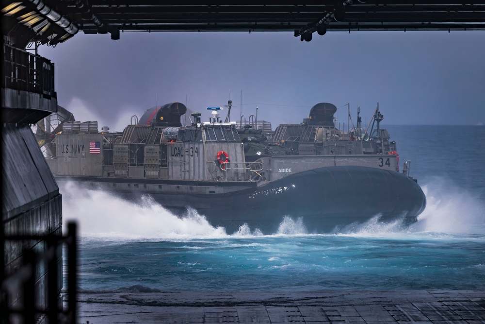 U.S. Marines Assigned to 22nd MEU Depart USS Iwo Jima During An Exercise