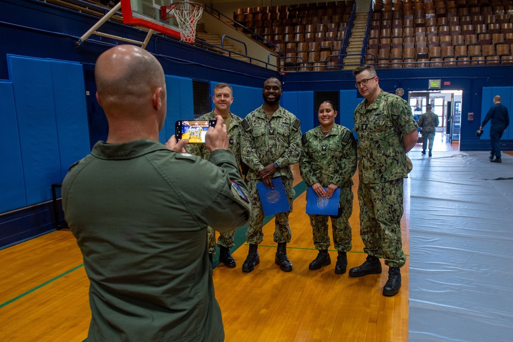 Headline: USS Ronald Reagan (CVN 76) frocks newly appointed petty officers