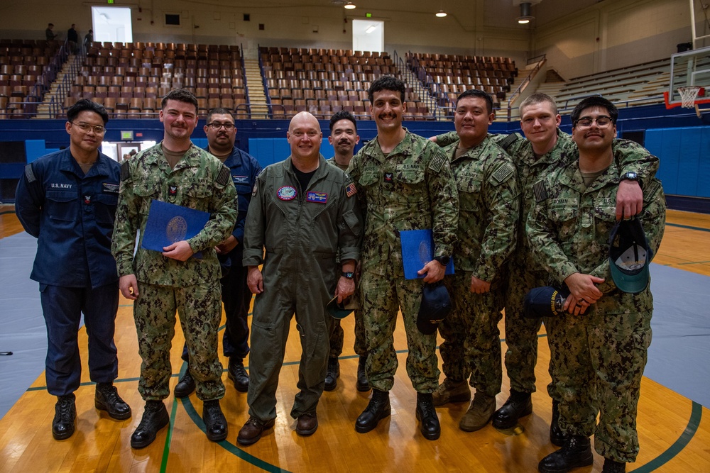 Headline: USS Ronald Reagan (CVN 76) frocks newly appointed petty officers