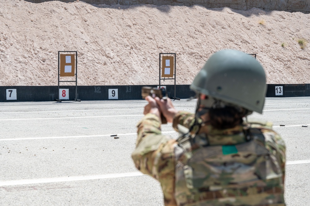 Members of 332nd Air Expeditionary Wing quick strike team qualify on M18 pistol