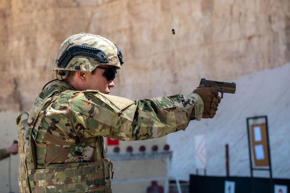 Members of 332nd Air Expeditionary Wing quick strike team qualify on M18 pistol