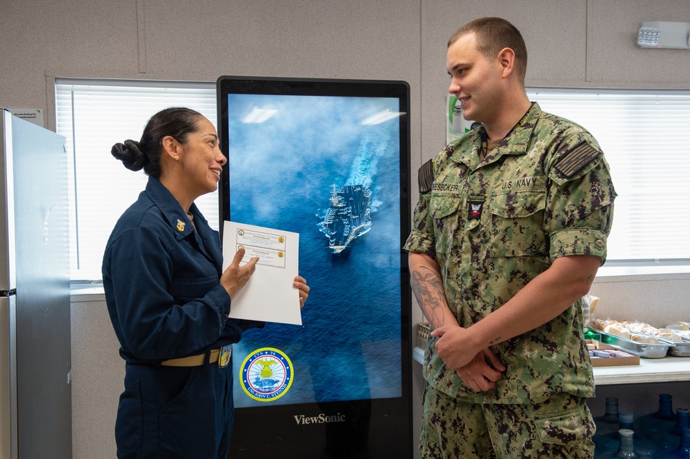 Mass Communication Specialist 2nd Class Max Biesecker Receives Warfighter of the Week