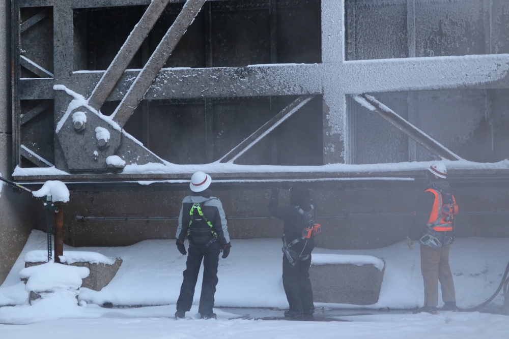 Dan Ferris, Chicago District Engineer, assists with Soo Lock &amp; Dam inspection