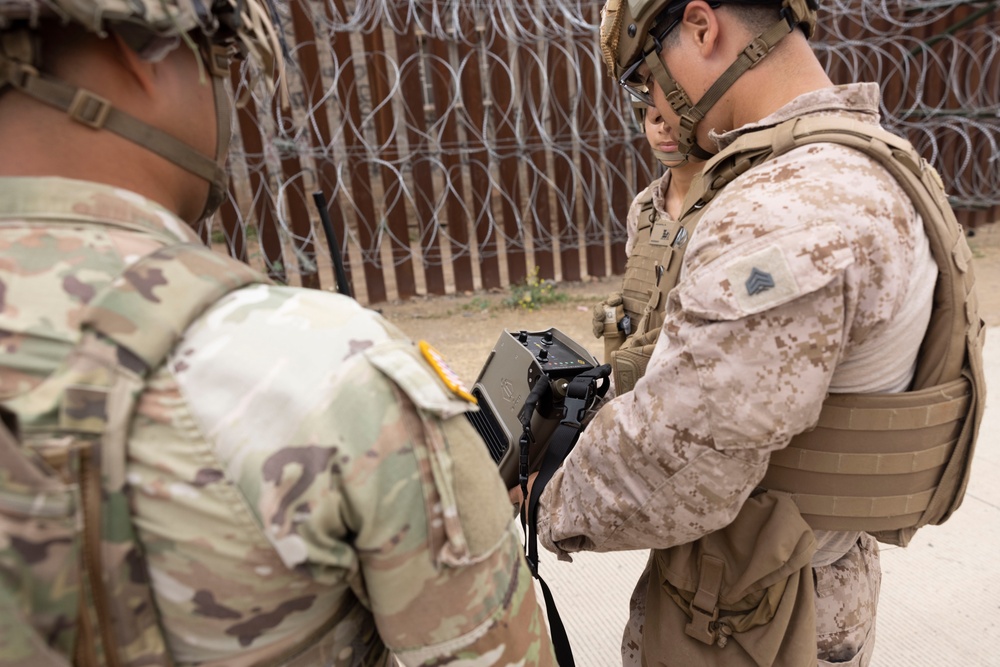 U.S. Soldiers with 549th Military Police share anti-drone training with U.S. Marines