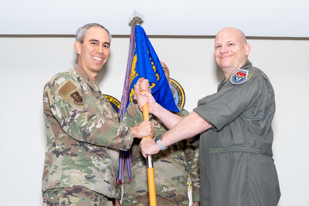 Colonel Vinh Tran takes command of the 60th operational Medical Readiness Squadron