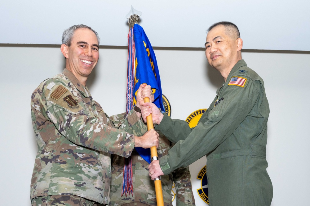 Colonel Vinh Tran takes command of the 60th operational Medical Readiness Squadron