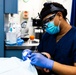 George Washington Sailors Conduct Dental Exam