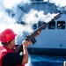 USS Benfold (DDG 65) conducts a replenishment at sea in the South China Sea