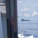 USS Benfold (DDG 65) conducts a replenishment at sea in the South China Sea