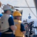 USS Benfold (DDG 65) conducts a replenishment at sea in the South China Sea