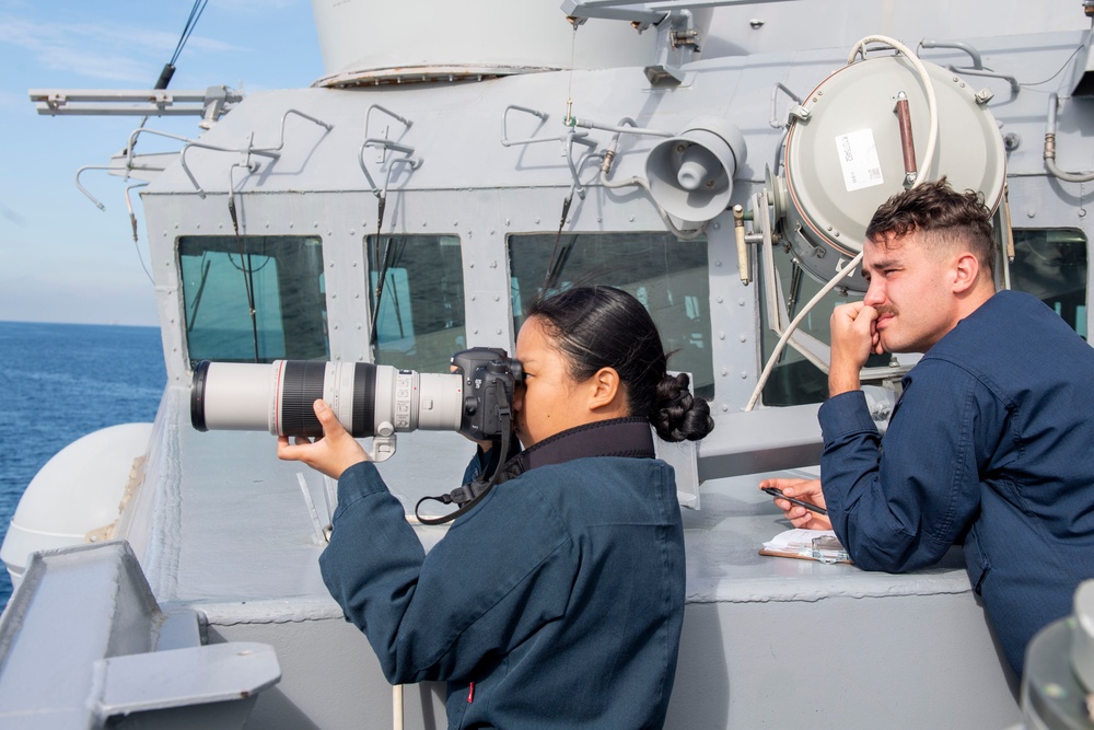 Sailors observe surface contacts