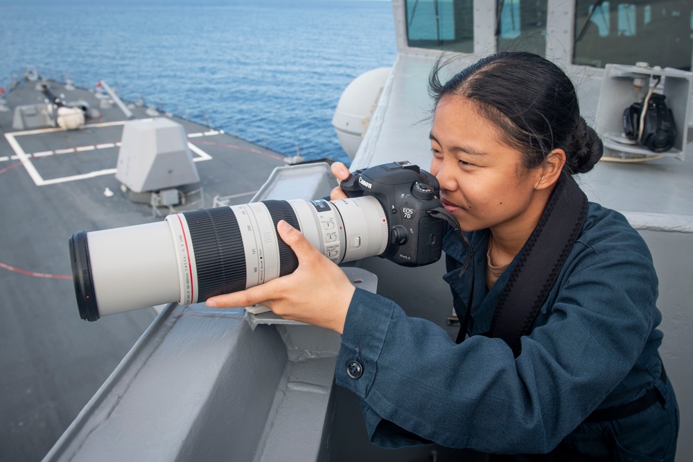 Sailors observe surface contacts