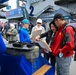 Fleet Week guests explore Coast Guard history through museum display