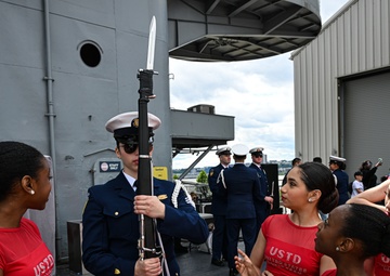 Coast Guard Silent Drill Team performs aboard USS Intrepid during Fleet Week New York