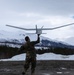 American And Norwegian Soldiers Play Hide And Seek