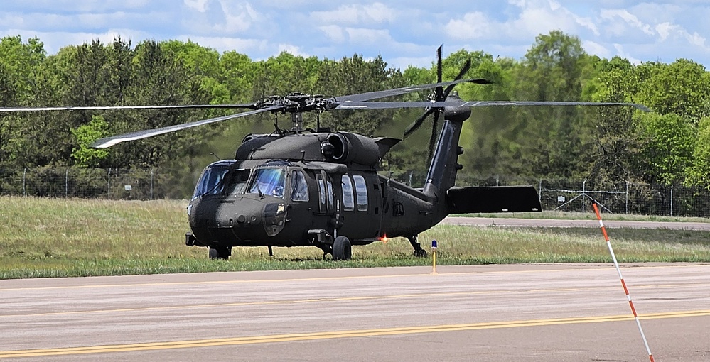 Soldiers with 13th Battalion, 100th Regiment hold slingload training at McCoy, Wisconsin National Guard Black Hawks, crews assist