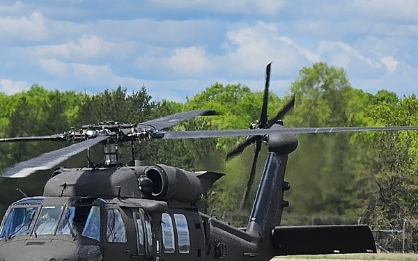 Soldiers with 13th Battalion, 100th Regiment hold slingload training at McCoy, Wisconsin National Guard Black Hawks, crews assist