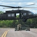 Soldiers with 13th Battalion, 100th Regiment hold slingload training at McCoy, Wisconsin National Guard Black Hawks, crews assist